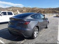 2023 Tesla Model Y — photo 4 of 20 | VIN 7SAYGDEE2PF879297