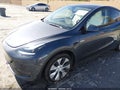 2023 Tesla Model Y — photo 6 of 20 | VIN 7SAYGDEE2PF879297