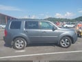 2012 Honda Pilot — photo 13 of 16 | VIN 5FNYF4H57CB011995
