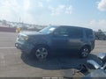 2012 Honda Pilot — photo 14 of 16 | VIN 5FNYF4H57CB011995