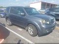 2012 Honda Pilot — photo 1 of 16 | VIN 5FNYF4H57CB011995