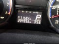 2010 Suzuki SX4 — photo 15 of 16 | VIN JS2YC5A28A6301403