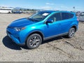 2018 Toyota RAV4 Hybrid — photo 2 of 21 | VIN JTMRJREV5JD194385