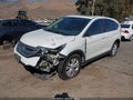 2014 Honda CR-V — photo 2 of 17 | VIN 5J6RM3H53EL013175
