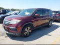 2018 Honda Pilot — photo 2 of 17 | VIN 5FNYF5H34JB025497