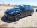 2022 Tesla Model Y — photo 2 of 17 | VIN 7SAYGDEE8NF427139