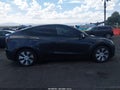 2024 Tesla Model Y — photo 11 of 14 | VIN 7SAYGAEE4RF073818