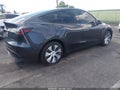 2024 Tesla Model Y — photo 4 of 14 | VIN 7SAYGAEE4RF073818