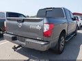 2017 Nissan Titan — photo 4 of 16 | VIN 1N6AA1E69HN574189