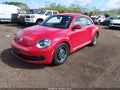 2012 Volkswagen Beetle — photo 2 of 15 | VIN 3VWHP7AT8CM636311