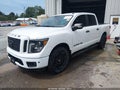 2019 Nissan Titan — photo 2 of 11 | VIN 1N6AA1E5XKN524464