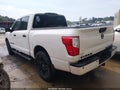2019 Nissan Titan — photo 3 of 11 | VIN 1N6AA1E5XKN524464