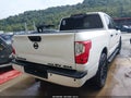 2019 Nissan Titan — photo 4 of 11 | VIN 1N6AA1E5XKN524464