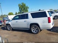 2016 Chevrolet Suburban — photo 14 of 16 | VIN 1GNSCJKC1GR406220