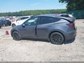 2023 Tesla Model Y — photo 14 of 18 | VIN 7SAYGDEE4PA197244