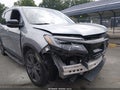 2022 Honda Pilot — photo 6 of 16 | VIN 5FNYF6H36NB080271