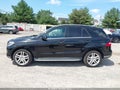 2014 Mercedes-Benz ML-Class — photo 14 of 16 | VIN 4JGDA5HB9EA273565