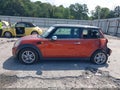 2011 Mini Cooper — photo 13 of 15 | VIN WMWSU3C58BT096724