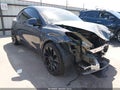 2022 Tesla Model Y — photo 1 of 20 | VIN 7SAYGDEE9NF387136