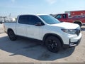 2021 Honda Ridgeline — photo 13 of 16 | VIN 5FPYK3F8XMB012098