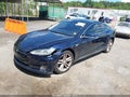 2014 Tesla Model S — photo 2 of 21 | VIN 5YJSA1H19EFP51146