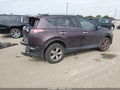 2018 Toyota RAV4 — photo 4 of 17 | VIN 2T3DFREV9JW736148