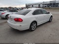 2014 Volkswagen Passat — photo 4 of 16 | VIN 1VWBP7A3XEC015128