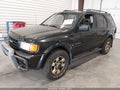 1999 Isuzu Rodeo — photo 2 of 15 | VIN 4S2CM58W2X4345013
