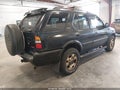 1999 Isuzu Rodeo — photo 4 of 15 | VIN 4S2CM58W2X4345013