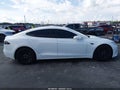 2016 Tesla Model S — photo 12 of 15 | VIN 5YJSA1E22GF166957