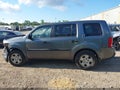 2012 Honda Pilot — photo 15 of 17 | VIN 5FNYF4H2XCB013410