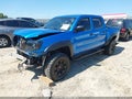 2009 Toyota Tacoma — photo 2 of 21 | VIN 3TMJU62N09M075909
