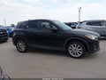 2013 Mazda CX-5 — photo 13 of 16 | VIN JM3KE4DE3D0163813