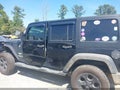 2011 Jeep Wrangler Unlimited — photo 14 of 16 | VIN 1J4BA5H15BL533277