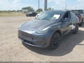 2022 Tesla Model Y — photo 2 of 18 | VIN 7SAYGDEE0NF388191