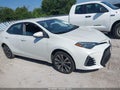 2018 Toyota Corolla — photo 13 of 16 | VIN 5YFBURHE1JP835372