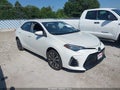 2018 Toyota Corolla — photo 1 of 16 | VIN 5YFBURHE1JP835372
