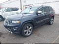 2014 Jeep Grand Cherokee — photo 2 of 16 | VIN 1C4RJFCG9EC530585