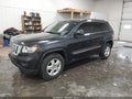 2013 Jeep Grand Cherokee — photo 2 of 16 | VIN 1C4RJFAG2DC555488