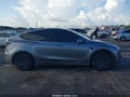 2026 Tesla Model Y — photo 11 of 14 | VIN 7SAYGDED9TA477971