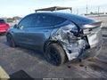 2026 Tesla Model Y — photo 3 of 14 | VIN 7SAYGDED9TA477971