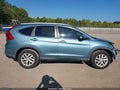 2016 Honda CR-V — photo 14 of 17 | VIN 2HKRM3H76GH550640