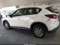 2014 Mazda CX-5 — photo 15 of 17 | VIN JM3KE2BE1E0424834