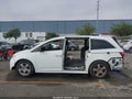 2011 Honda Odyssey — photo 13 of 15 | VIN 5FNRL5H96BB072985