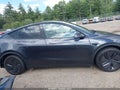 2026 Tesla Model Y — photo 12 of 15 | VIN 7SAYGDED1TF669209