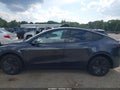 2026 Tesla Model Y — photo 13 of 15 | VIN 7SAYGDED1TF669209