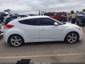 2012 Hyundai Veloster — photo 13 of 16 | VIN KMHTC6AD4CU064172