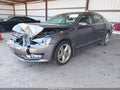 2014 Volkswagen Passat — photo 2 of 16 | VIN 1VWCN7A34EC011621