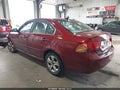 2009 Kia Optima — photo 3 of 16 | VIN KNAGE228995317755