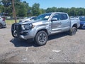 2021 Toyota Tacoma — photo 2 of 17 | VIN 5TFAZ5CN2MX099593